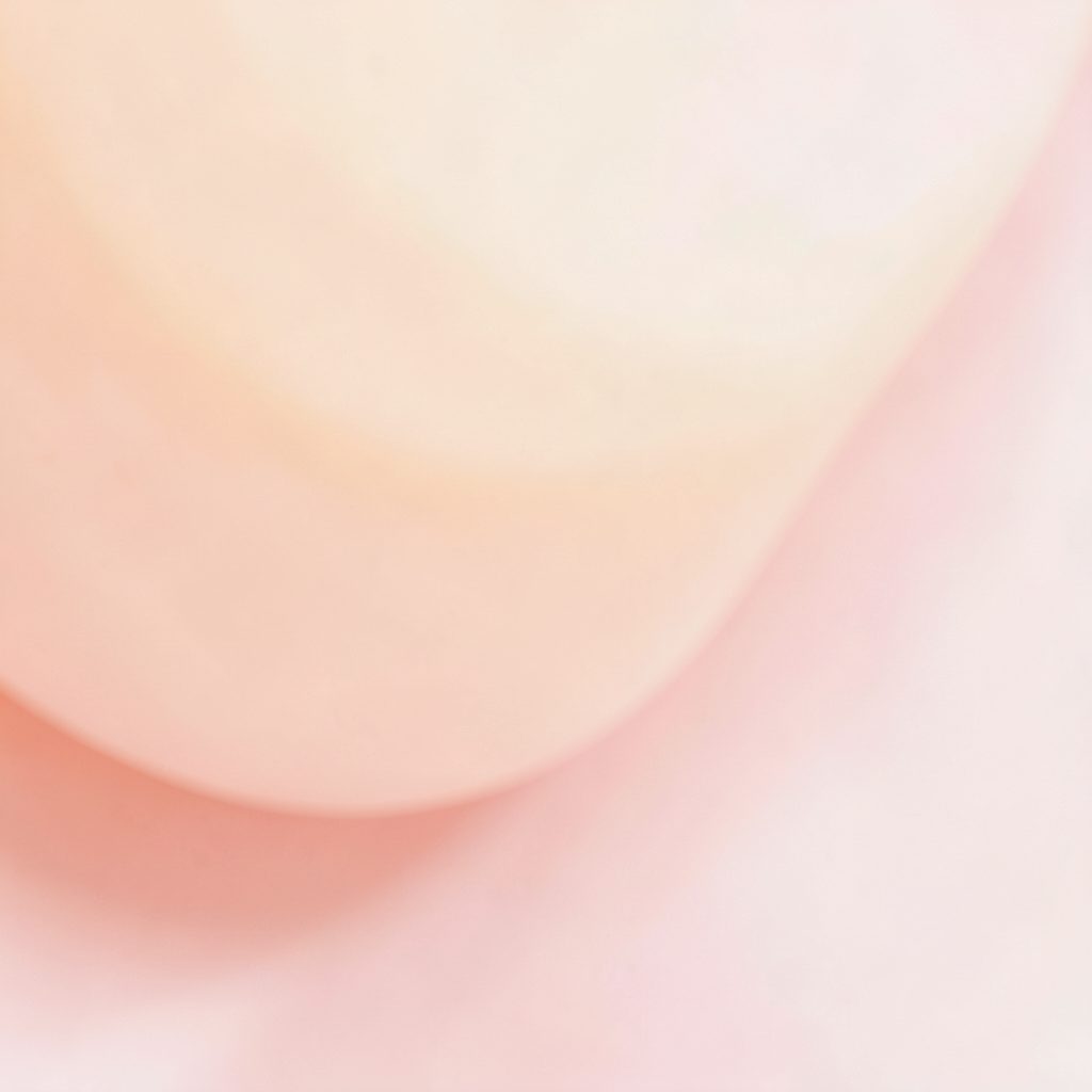 Soft warm abstract background in creamy peach and pale pink, soothing and neutral