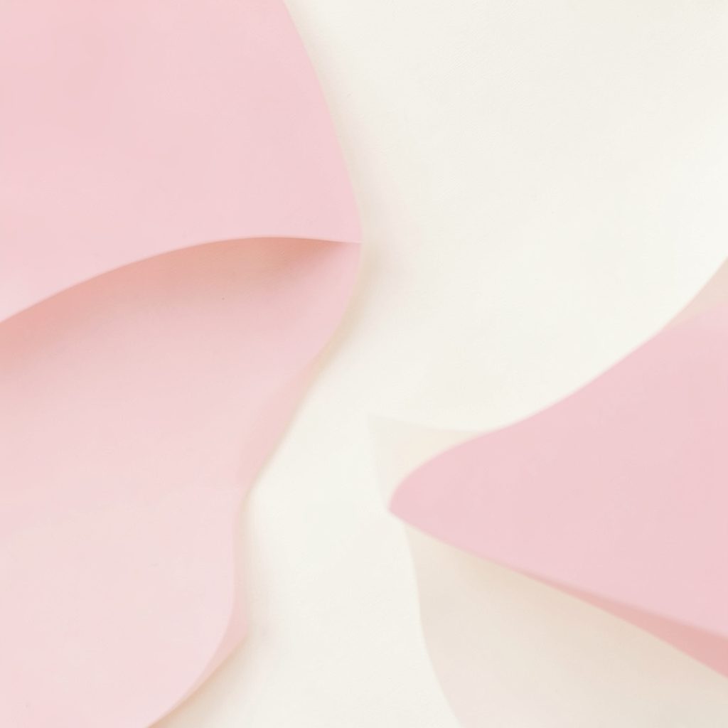 Soft abstract backdrop in pale pink and cream, light and approachable